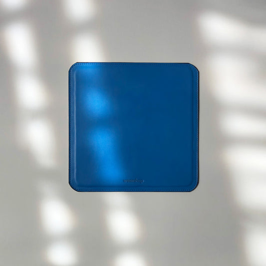 Italian leather mouse pad in bright blue colour. Made in Canada.