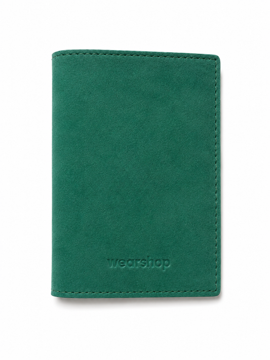 A green suede passport cover with visible stitching and the debossed brand name 'wearshop' near the bottom, shown on a plain white background.